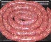 Boerewors is a type of sausage, popular in South African cuisine. The name comes from the Afrikaans words boer ("farmer") and wors ("sausage"). Boerewors is made from coarsely minced beef (sometimes combined with minced pork, lamb, or both) and various spices.